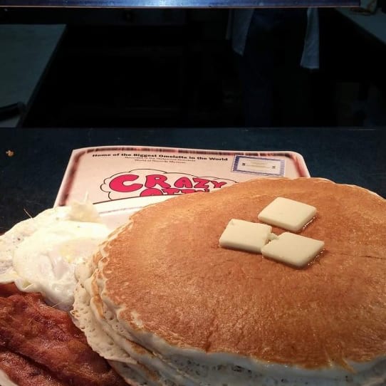 Stack of 3 Pancakes with Meat and 2 Eggs.